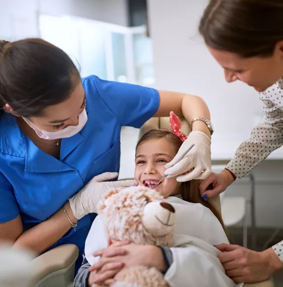 Smiling child having dental work completed